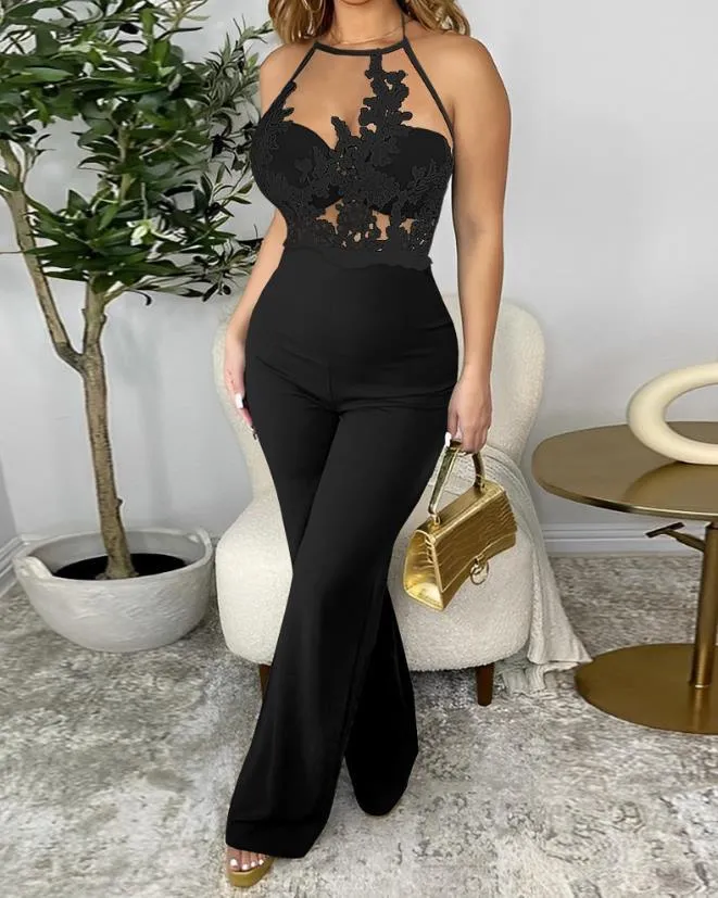 ELEGANCE IN CONTRAST HALTER JUMPSUIT