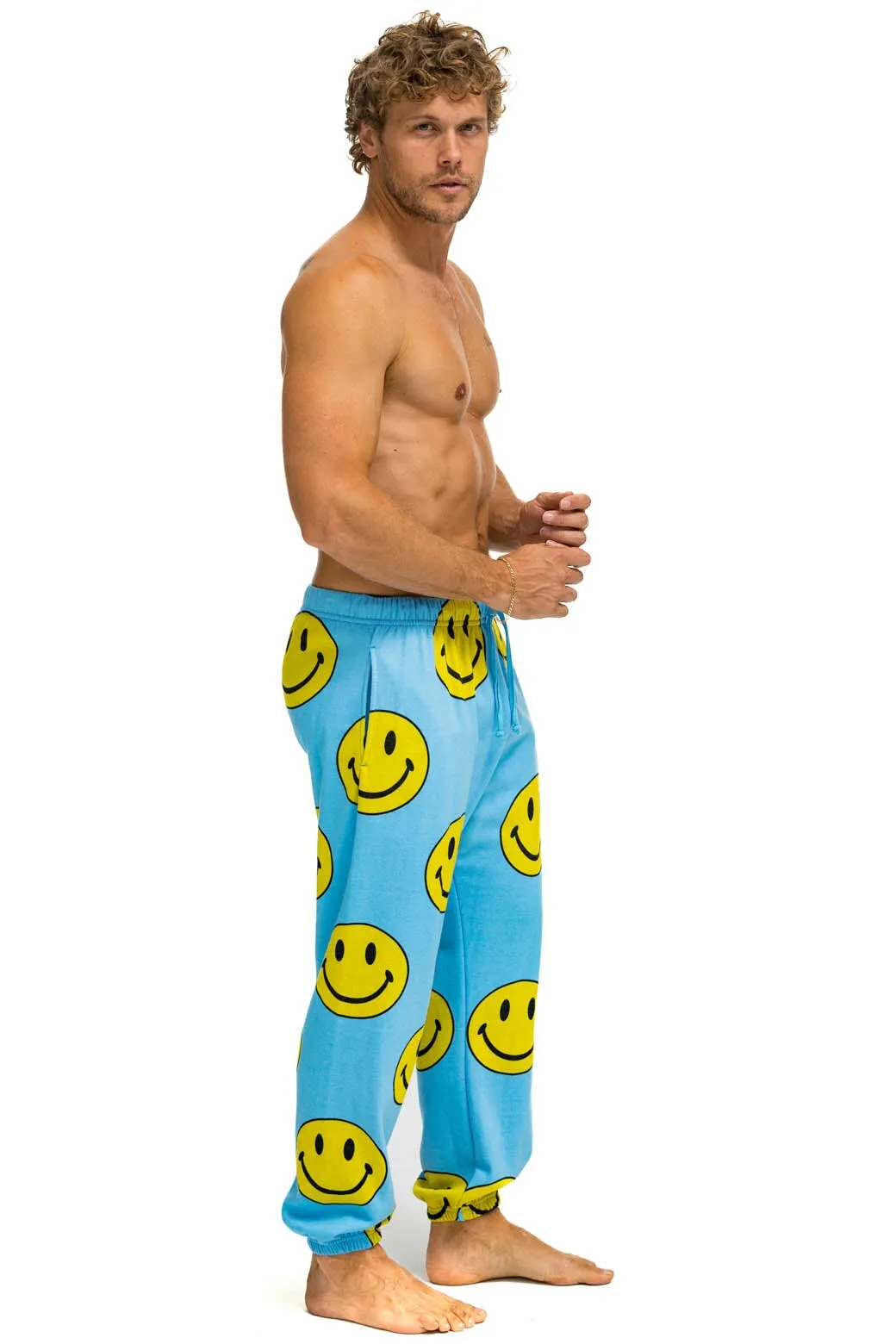 SMILEY REPEAT MENS SWEATPANTS - SKY