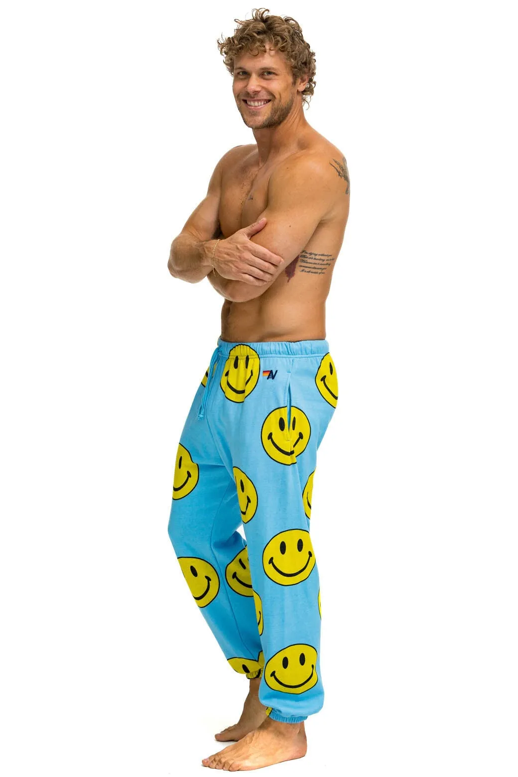 SMILEY REPEAT MENS SWEATPANTS - SKY